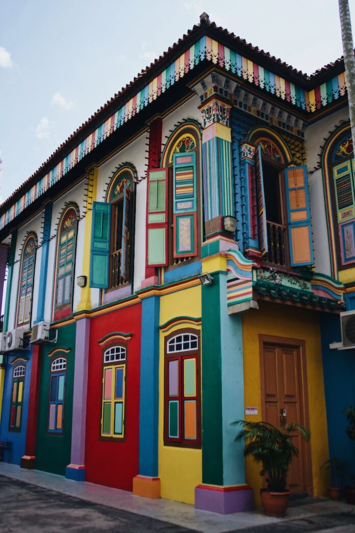 multicolored concrete buildings under blue skies